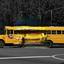 A school bus makes its way around a turn..jpg